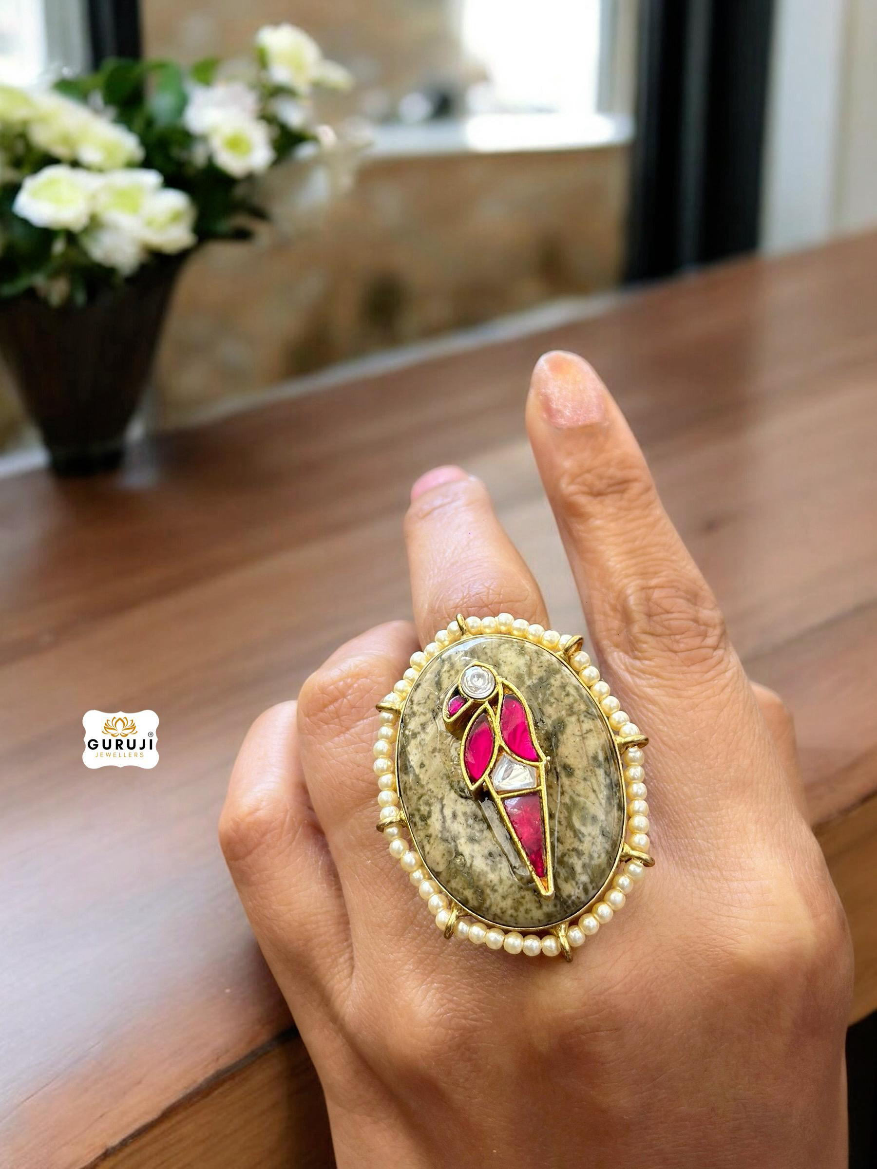 Gracefully Detailed Oval Ring with Artistic Elegance