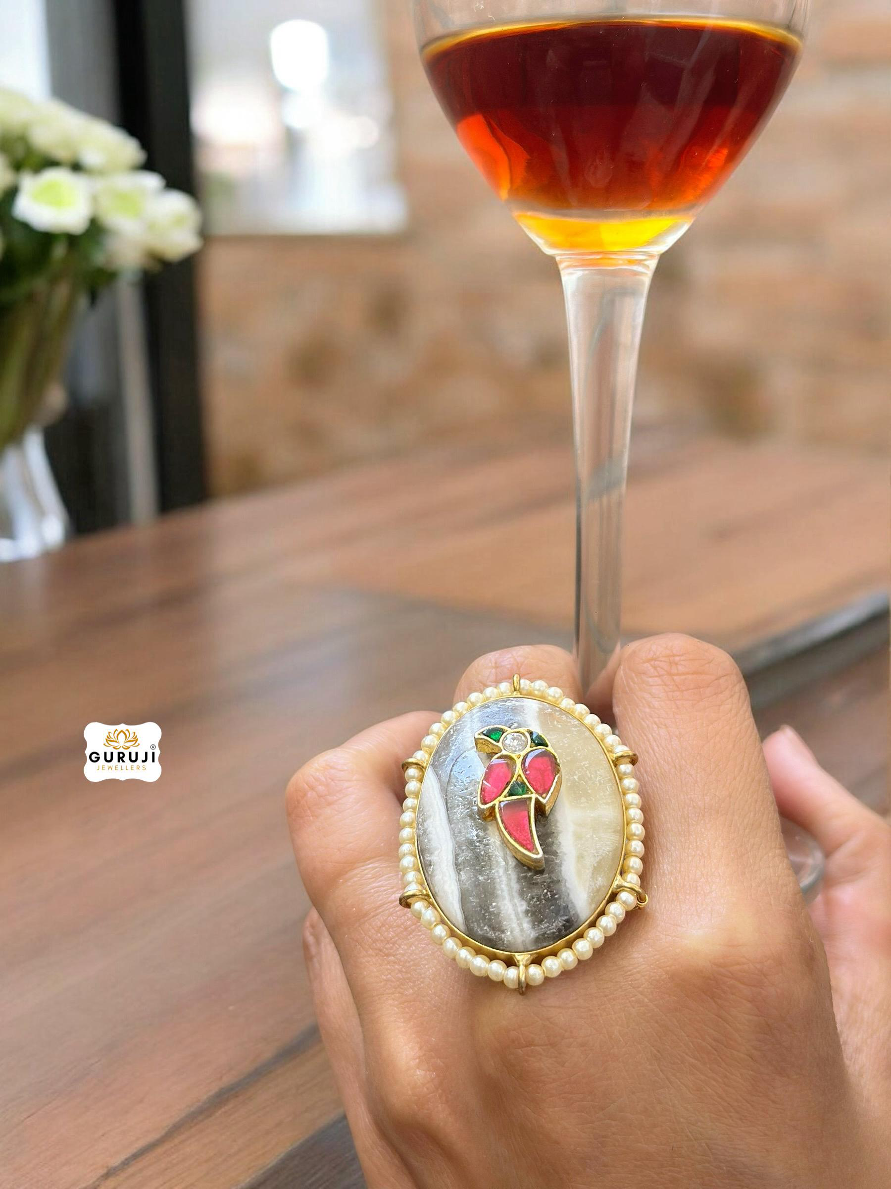 Sophisticated Oval Stone Ring with Artistic Flair